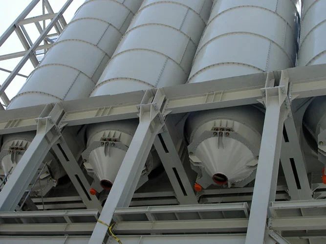 Silo Discharge Aids: Air Cannons, Vibrators and Flow Promotion Systems